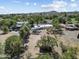 Aerial view of a single Gathering home and property in a tranquil desert community at 100 Swilling Ave, Wickenburg, AZ 85390