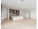 A living room features tile floors and recessed lighting at 10302 E Utah Ave, Mesa, AZ 85212