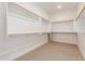 Large walk-in closet with custom shelving and ample storage space for clothing and accessories at 10302 E Utah Ave, Mesa, AZ 85212