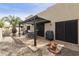 Charming back patio featuring a brick surface, pergola, and desert landscaping creates a relaxing outdoor space at 10812 N 117Th Pl, Scottsdale, AZ 85259