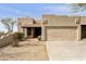 Inviting desert home with a brick walkway, xeriscaped yard, and attached garage and covered entry at 10812 N 117Th Pl, Scottsdale, AZ 85259