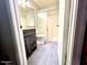 Bathroom with a tiled shower and a modern dark vanity at 1222 W Baseline Rd # 159, Tempe, AZ 85283