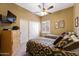 Cozy bedroom featuring twin beds, a dresser, and a closet, perfect for guests or Gathering at 12706 E Desert Cove Ave, Scottsdale, AZ 85259