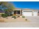 Charming single-story home featuring a three-car garage and low-maintenance desert landscaping at 12706 E Desert Cove Ave, Scottsdale, AZ 85259