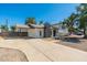 Charming single-Gathering home featuring a gray painted chimney and a covered front porch at 13807 N 33Rd Dr, Phoenix, AZ 85053