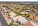 Wide aerial view of a neighborhood, featuring homes with pools and desert landscaping at 15803 E Tumbleweed Dr, Fountain Hills, AZ 85268