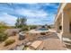 Desert backyard featuring a swimming pool, spa, and mature landscaping, offering a private oasis at 15803 E Tumbleweed Dr, Fountain Hills, AZ 85268