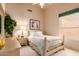 Comfortable bedroom with a full size bed and green accents at 15803 E Tumbleweed Dr, Fountain Hills, AZ 85268