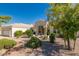 Charming single-story home features manicured landscaping, a stucco exterior, and a tile roof at 15803 E Tumbleweed Dr, Fountain Hills, AZ 85268