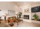 Comfortable living room featuring a fireplace and TV at 15803 E Tumbleweed Dr, Fountain Hills, AZ 85268