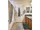 Bright bathroom features a granite countertop vanity and tiled shower with a neutral color scheme at 16243 N 27Th St, Phoenix, AZ 85032