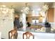 Kitchen featuring granite counters, stainless steel appliances, sink, pendant lights and wood cabinets at 16243 N 27Th St, Phoenix, AZ 85032