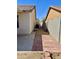 Narrow side yard featuring tile paver and gravel at 16243 N 27Th St, Phoenix, AZ 85032