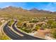 Stunning aerial view of property featuring desert landscape and panoramic mountain views at 17505 N 96Th Way, Scottsdale, AZ 85255