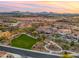 Scenic aerial view of the community, highlighting a green space and playground at 17505 N 96Th Way, Scottsdale, AZ 85255