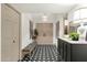 Bright foyer showcasing decorative tile flooring, an eye-catching light fixture and ample storage at 18833 E Latigo Ln, Rio Verde, AZ 85263