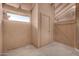 Enclosed patio with a storage unit, concrete flooring and lattice roof at 20421 N 3Rd Dr # 2, Phoenix, AZ 85027