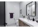 Elegant bathroom featuring a modern vanity and white subway tile at 20745 N Verbena Ln, Maricopa, AZ 85138