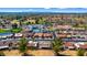 Aerial shot showcasing a community near a golf course, a pool, and nearby amenities at 2284 Leisure World --, Mesa, AZ 85206