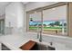 View of the kitchen sink and window overlooking the patio and golf course at 2284 Leisure World --, Mesa, AZ 85206