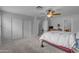 This bedroom boasts ample closet space and access to a bathroom at 2501 E Los Alamos St, Gilbert, AZ 85295