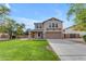 Charming two-story home with a well-manicured lawn and a spacious driveway, perfect for Gathering living at 2501 E Los Alamos St, Gilbert, AZ 85295