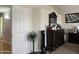 Bedroom showing a dresser and multiple fans in the corner at 2542 S Rowen St, Mesa, AZ 85209