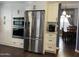 Kitchen view featuring stainless steel appliances and ample cabinet space at 2542 S Rowen St, Mesa, AZ 85209