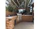 This outdoor kitchen features a stainless steel grill and stone accents at 2542 S Rowen St, Mesa, AZ 85209