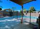 Backyard swimming pool with a dark fence at 2542 S Rowen St, Mesa, AZ 85209