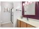 A renovated bathroom with glass shower and a large mirror at 2565 S Signal Butte Rd # 8, Mesa, AZ 85209