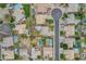 Aerial view of a residential neighborhood showcasing houses with private pools and well-maintained backyards at 2688 S Racine Ct, Gilbert, AZ 85295