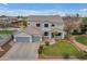 Aerial view of the property featuring lush landscaping, a pool, and a tennis court at 2688 S Racine Ct, Gilbert, AZ 85295