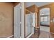 Bathroom featuring a glass shower, a bathtub, and a view into a bedroom through a doorway at 2688 S Racine Ct, Gilbert, AZ 85295