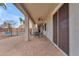 Covered patio with pavers, outdoor seating, and a view of the sparkling fenced pool at 2688 S Racine Ct, Gilbert, AZ 85295