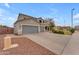 Attractive two-story home with a spacious driveway and a well-maintained landscape at 2688 S Racine Ct, Gilbert, AZ 85295