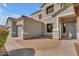 Close up front exterior elevation showing a two-car garage and covered porch at 2688 S Racine Ct, Gilbert, AZ 85295