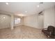 Bright living room with tile floors and large windows at 3223 W Rapalo Rd, Phoenix, AZ 85086