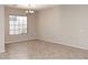 Bright living room with a decorative chandelier and large windows at 3223 W Rapalo Rd, Phoenix, AZ 85086