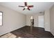 Large bedroom with dark wood flooring and lots of light at 3223 W Rapalo Rd, Phoenix, AZ 85086