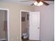 The bathroom with a toilet and tiled floor is conveniently located near the bedroom at 330 S Farmer Ave # 121, Tempe, AZ 85281