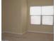 Interior bedroom with a neutral color palette and large window allowing ample natural light to flow at 330 S Farmer Ave # 121, Tempe, AZ 85281