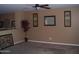 Inviting living room with neutral paint, framed art, and a decorative plant at 330 S Farmer Ave # 121, Tempe, AZ 85281