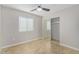 Serene bedroom with a window, fan, and closet space, offering a calm ambiance at 3402 N 32Nd St # 116, Phoenix, AZ 85018