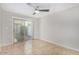 Well-lit bedroom with sliding glass door access to outdoor space and tile flooring at 3402 N 32Nd St # 116, Phoenix, AZ 85018
