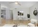 Open dining area with modern lighting, adjacent to kitchen and living space at 3402 N 32Nd St # 116, Phoenix, AZ 85018