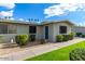 Charming single-story home with a tidy front yard, featuring lush green grass and trimmed shrubs at 3402 N 32Nd St # 116, Phoenix, AZ 85018