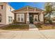 Charming single-story home featuring desert landscaping and a welcoming front porch area at 4061 N Point Ridge Rd, Buckeye, AZ 85396