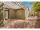 Paver patio featuring a white pergola with string lights, offering a cozy outdoor space for relaxing and entertaining at 4061 N Point Ridge Rd, Buckeye, AZ 85396