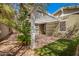 Charming patio area features a pergola, brick pavers, and a small grassy area, perfect for outdoor entertaining at 4061 N Point Ridge Rd, Buckeye, AZ 85396